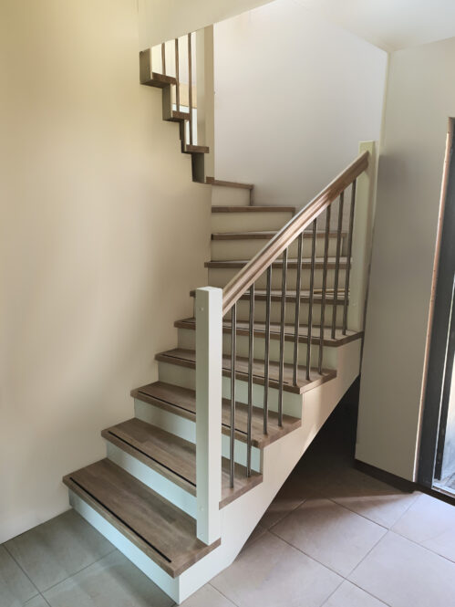 U-shaped stairs with anti-slip rubber strip. Wood-metal.