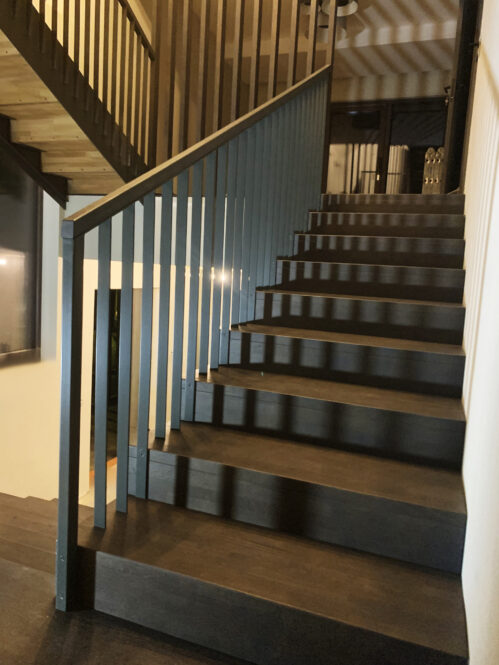 Design staircase with dark finish, oak steps.