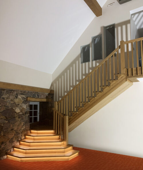 L-shaped staircase with a special solution. LED lighting.