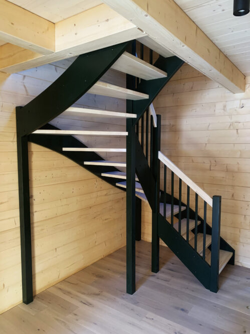 U-shaped staircase with anti-slip grooves and pine steps.